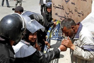 Egypt activist and police - source UN