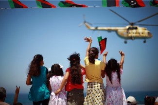 Parade in the western Libyan city of Zawia to mark the anniversary of last year's uprising.