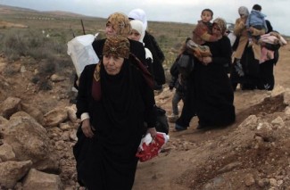 Women Syrian refugees Jordan border - UNHCR